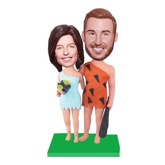 Flinstones Couple Bobbleheads With A Yellow And Red Roses